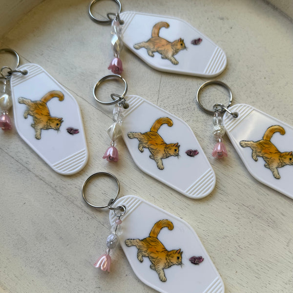 WANDERLUST CAT - MOTEL KEYCHAIN