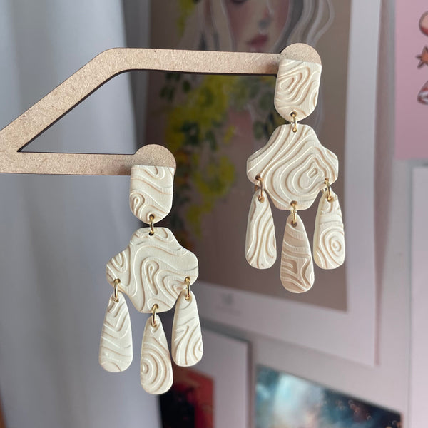 Swirl Embossed Statement Studs