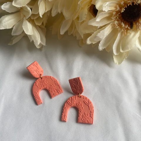 Floral Embossed Asymmetrical Arches