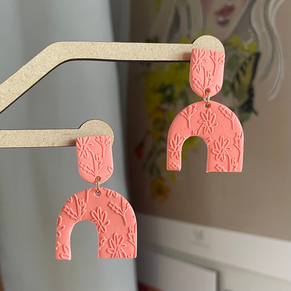 Floral Embossed Asymmetrical Arches