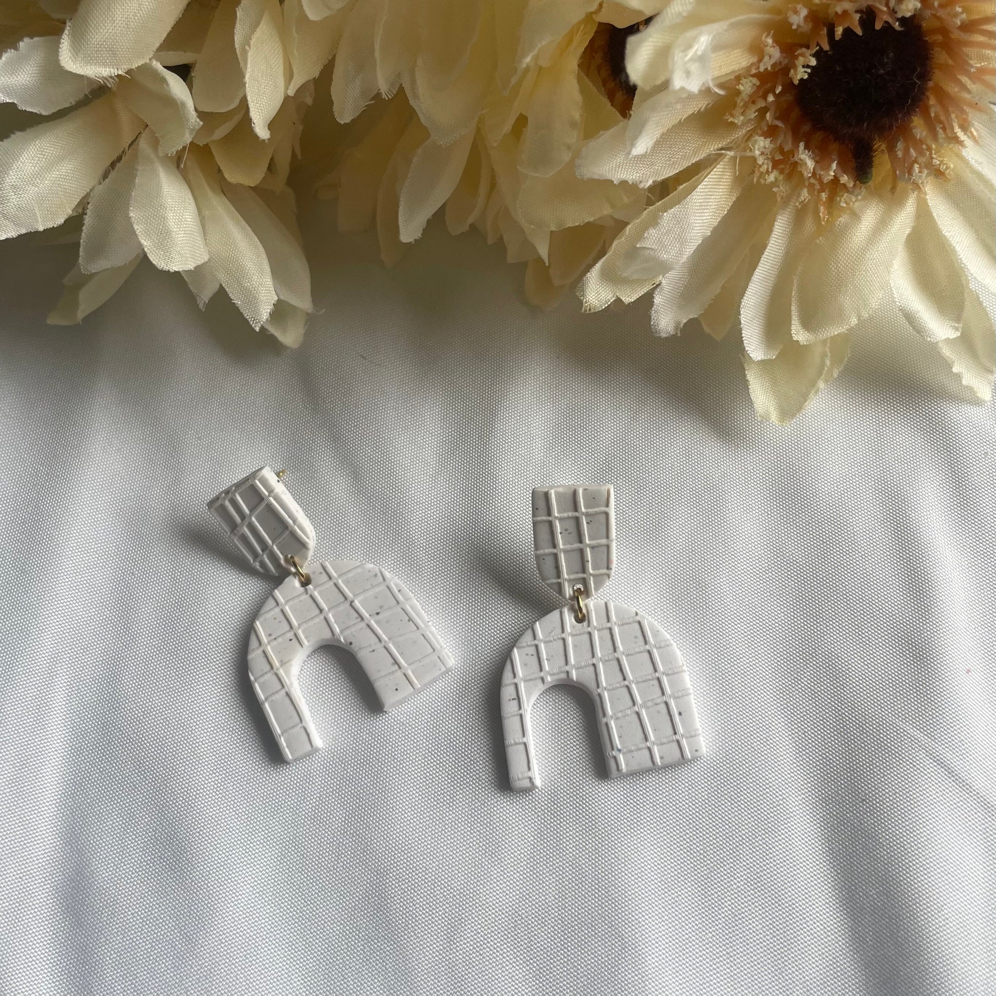 Waffle Embossed Asymmetrical Arches