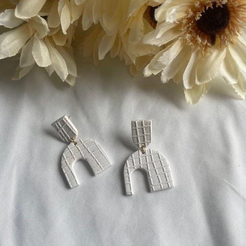 Waffle Embossed Asymmetrical Arches