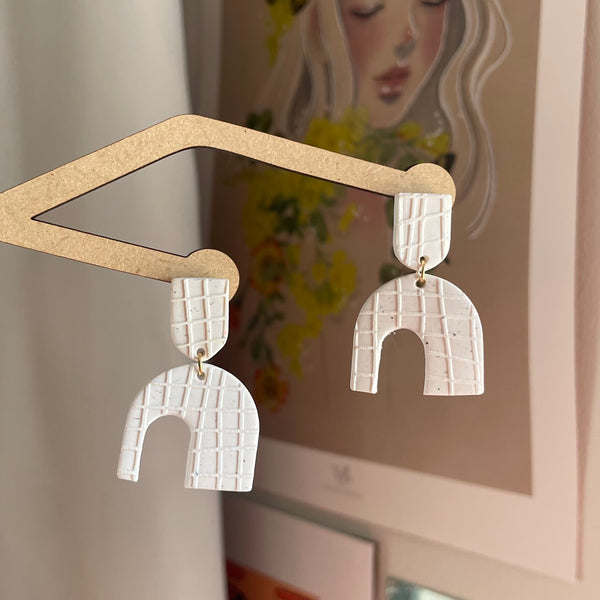 Waffle Embossed Asymmetrical Arches